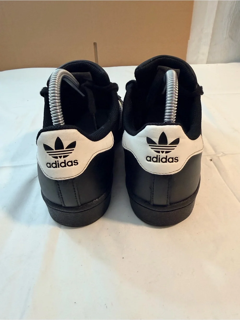 adidas Kids Black Sneakers with White Stripes and Gold Logo